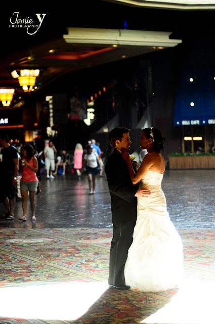 Bride and groom standing inside Mandalay Bay casino in las vegas