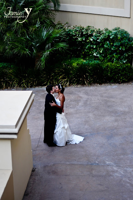 Mandalay bay wedding Bride and groom kissing outside of Mandalay bay after their wedding