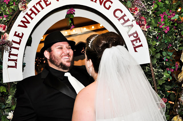 A happy groom smiling during his wedding at the Little white chapel in las vegas