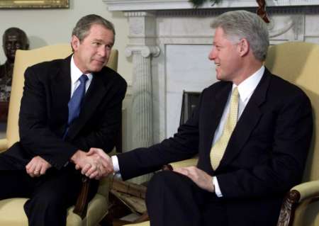[george.w.bush-bill.clinton.shake-hands.jpg]