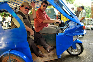 Dave Dewbre takes Mayor Ed Hagedorn of Puerto Princesa, Palawan on a ride on the new Etrkie prototype