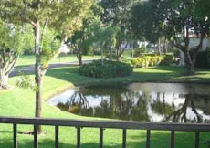 SOLD by Marilyn: Gorgeous BOCA LAGO  lake view from 2nd story Boca Lago condo