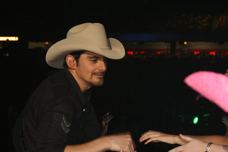 Tanner shaking Brad Paisley's hand at 2008 Houston Rodeo