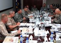 Gen. David Petraeus, Commander, U.S. Central Command, talks with regional U.S. commanders at the U.S. CENTCOM Commander's Conference. The conference is being held at U.S. Naval Forces Central Command in Bahrain May 20 - 22.