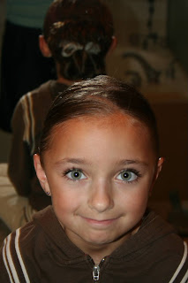 Portrait of young girl modeling "Pretzel-Twist Messy Bun"