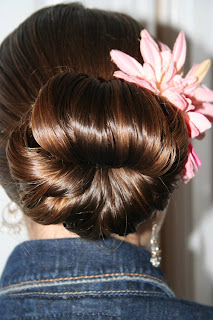 Back view of young girl modeling "Teen Hair Bun" hairstyle