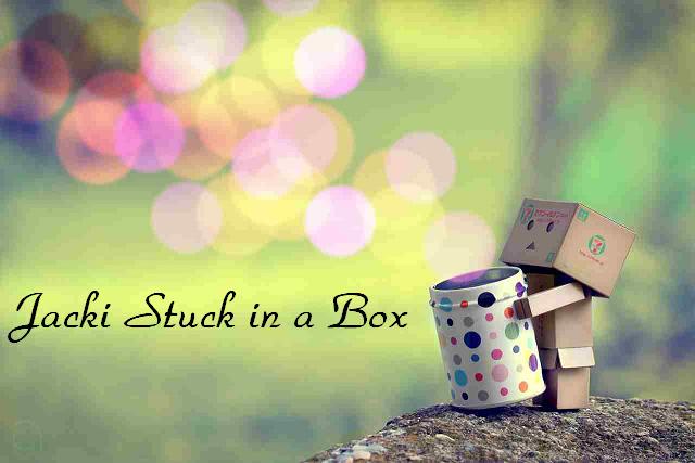 Jacki stuck in a box