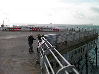 throwing stones off Southsea pier