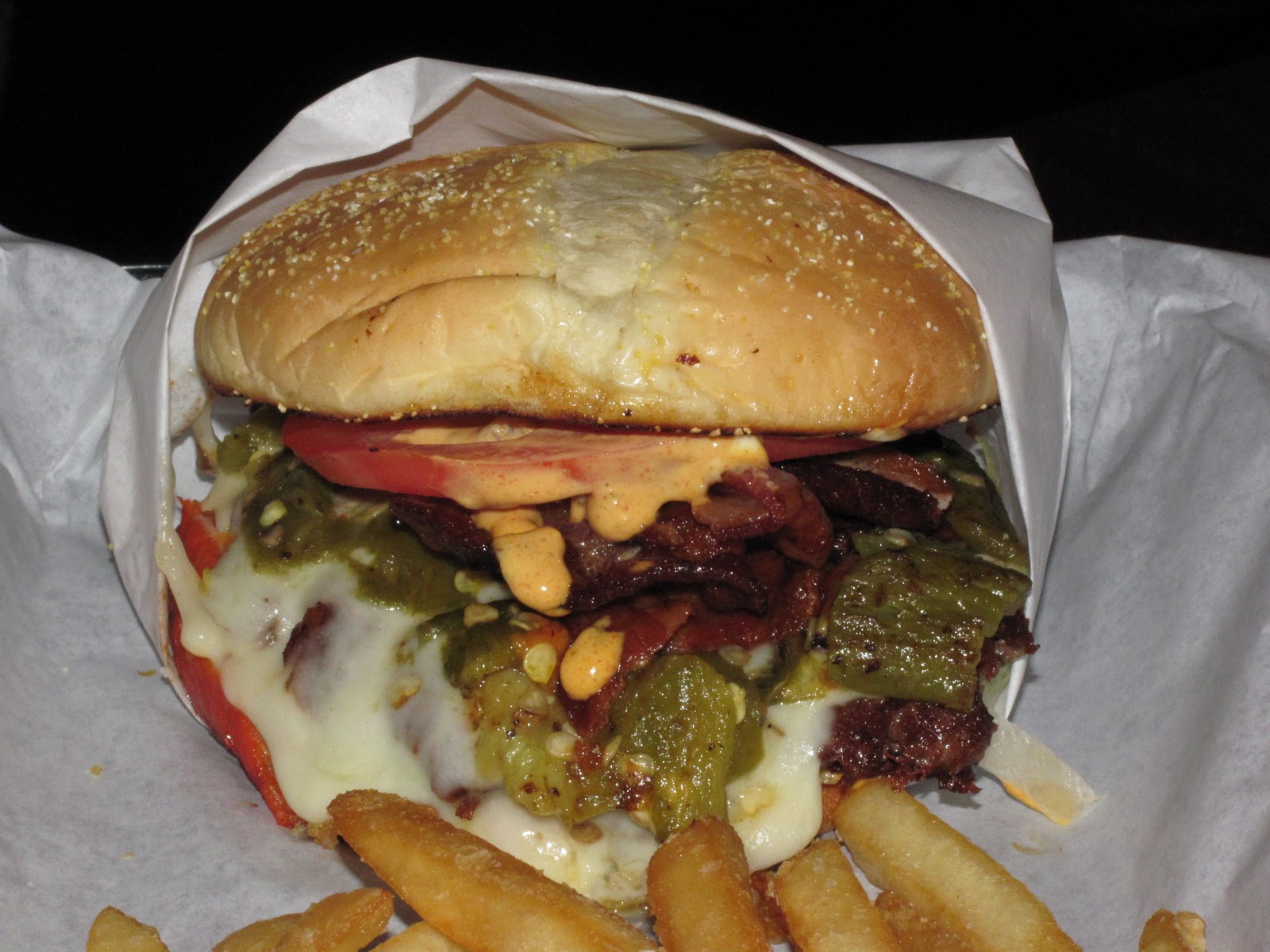 BIG GUY SHARING FOOD KILLER BURGER 47TH and Sandy