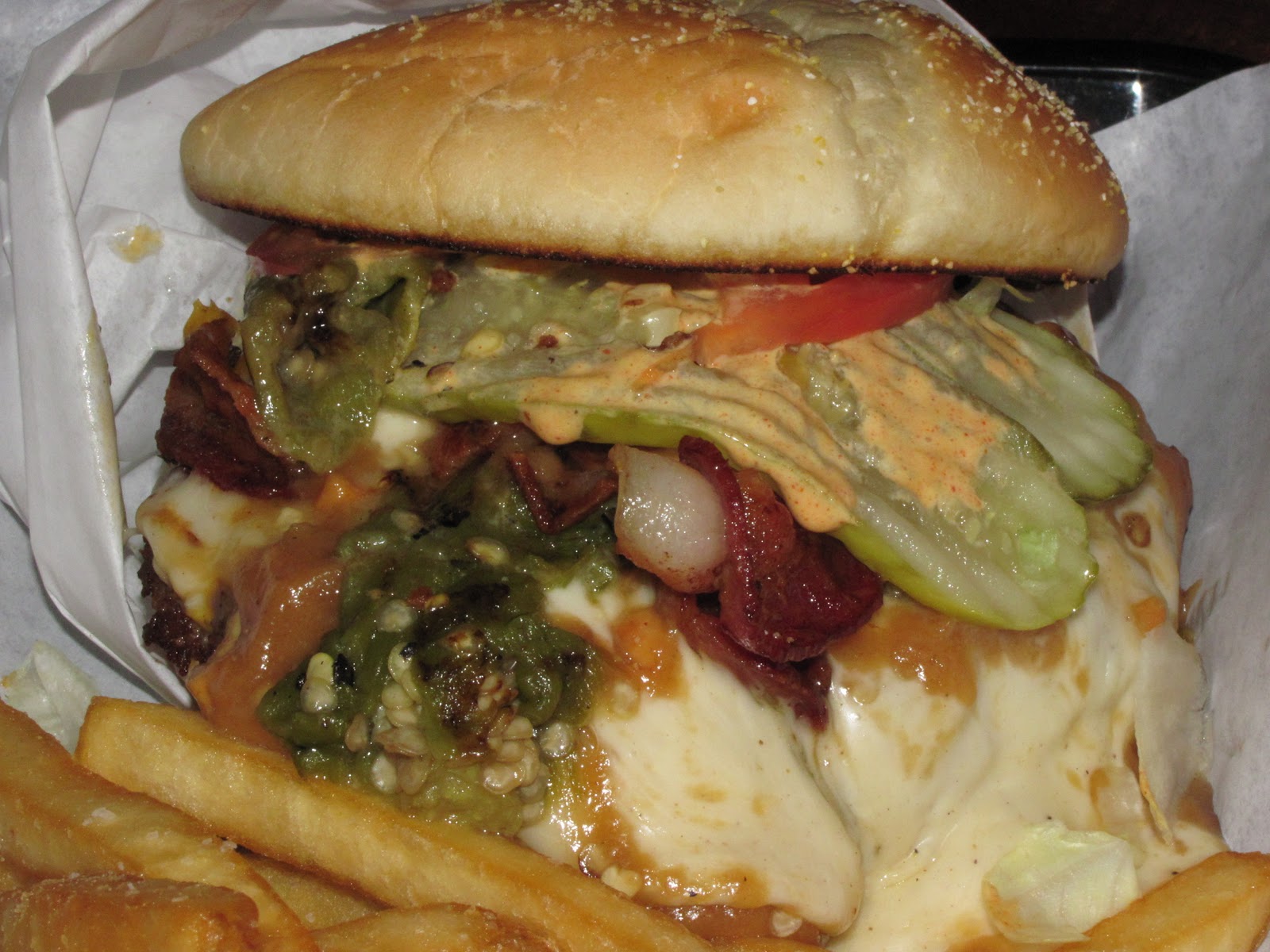 BIG GUY SHARING FOOD KILLER BURGER 47TH and Sandy