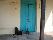 man sleeping at cellular prison
