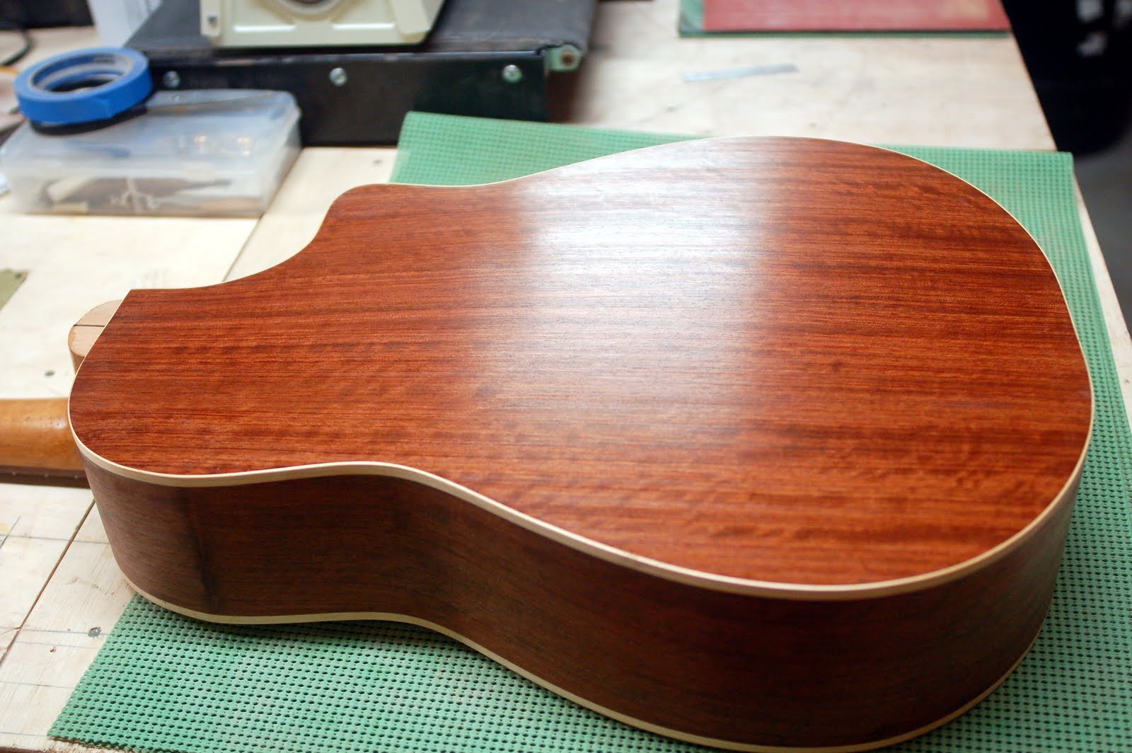 ThreeQuartersLeft French polishing the guitar