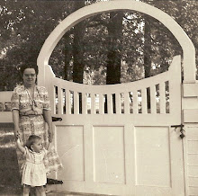 A Young Cassandra & Grandmother Lavenua by her "back-40" gate...