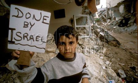 [1102_boy_sign_palestine_israel_war_jenin.jpg]
