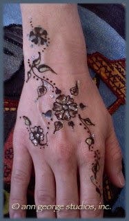 gilded henna tattoo
