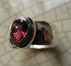 Pools Of Contentment.  Teardrop Shaped Spinel On Hammered Silver Band