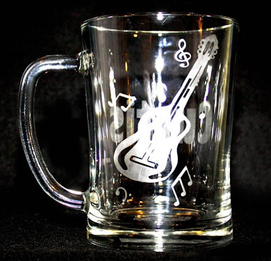 Mug with guitar design on back