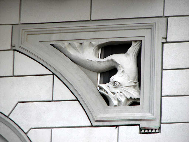 Fishes on the facade of the Grand Hotel Palazzo, Livorno