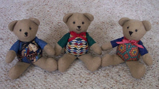 three teddy bears