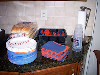 plates, napkins, silverware and cups all orange and blue or with Tigers logo