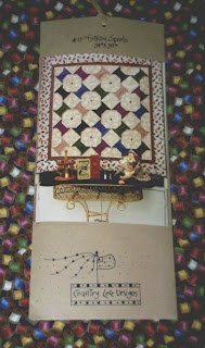 Whirl Into Winter prize - a spools quilt wallhanging and a yard of spools fabric