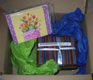 box of fabrics and note cards from Debi