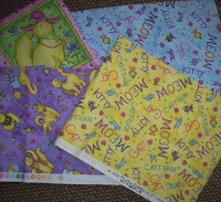 four kitty fabrics won in a giveaway
