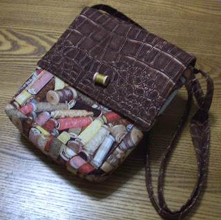 purse made with thread spool fabric
