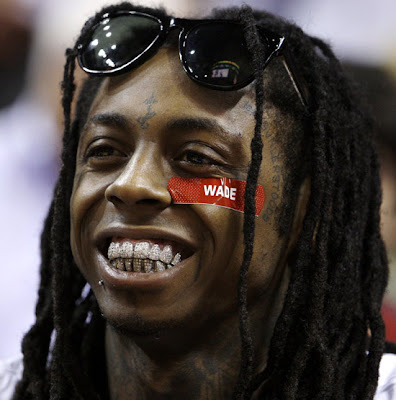 Lil Wayne is never spotted without one of his trademark grillz, his favorite 