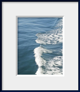 framed photo of ocean blue water rippled and foamed