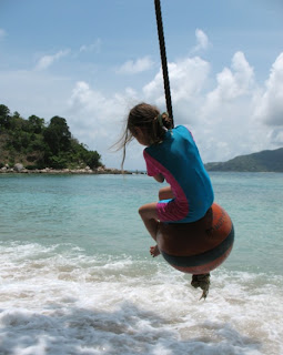 Swinging at Paradise beach