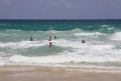 People playing in the waves at Karon Beach