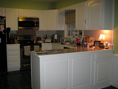 painting kitchen cabinets before and after. After shot - white cabinets