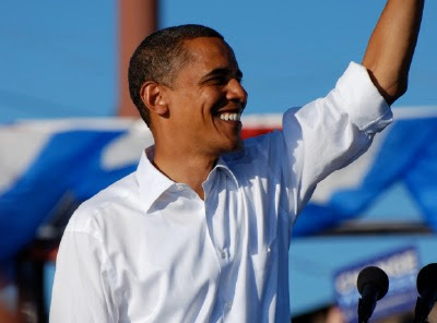 Barack Obama waving to the crowd at the Colorado State Fairgrounds rally in Pueblo, Colorado