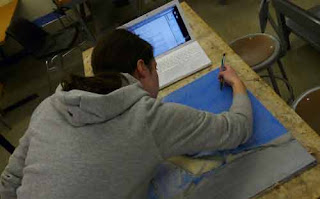 Alex carving the scintillation material.