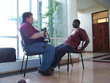 talking with Fidel at the Africa Nazarene University, Kenya