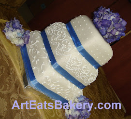 Three tier square fondant wedding cake