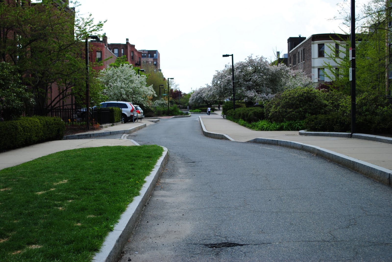 Calm Streets Boston Narrow roadway with high curbs to prevent parked