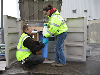 Collecting stormwater samples in the North Boeing Field area