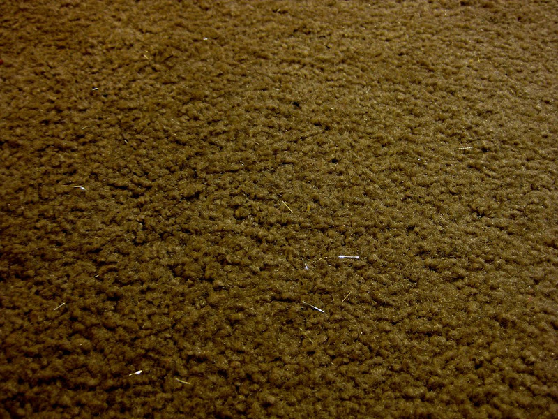 our carpet, post-craft, littered with silver hairy tinsel bits