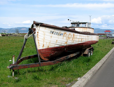 Pipe Dream II - A boat by the side of the road