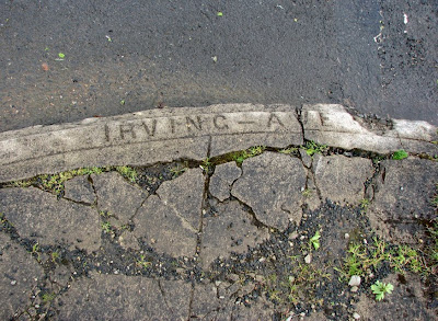 Street name stamped in the corner at Irving and 11th Streets, Astoria, Oregon