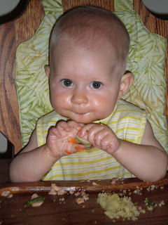 baby eating carrot