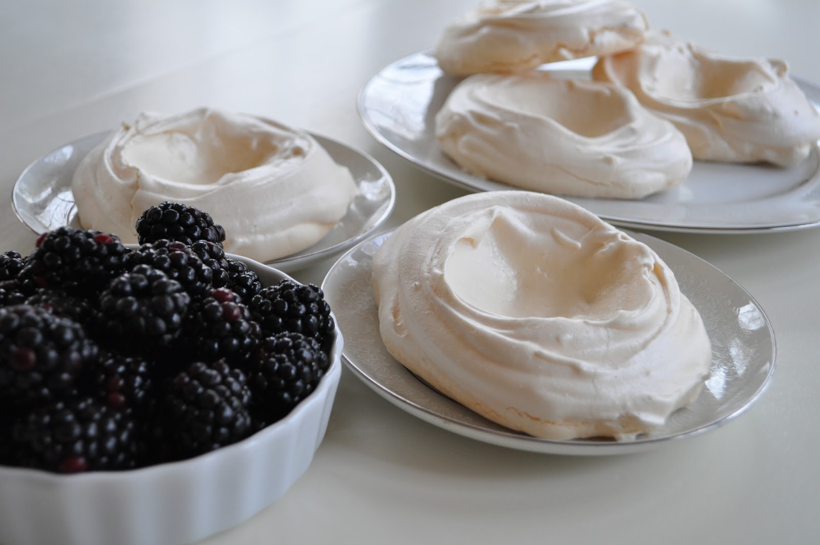 Kneading My Dream Meringue Nests with Blackberries and Cream