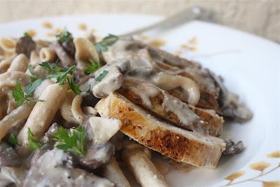 plate with chicken, mushrooms, and creamy pasta