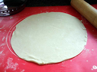  The dough is rolled out and is ready for the pie pan.