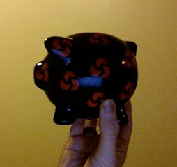 The Natwest Piggy Bank - Side View