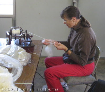 Teena & her electric spinner helped the spinners stay ahead of the weaving Teena & her electric spinner helped the spinners stay ahead of the weaving