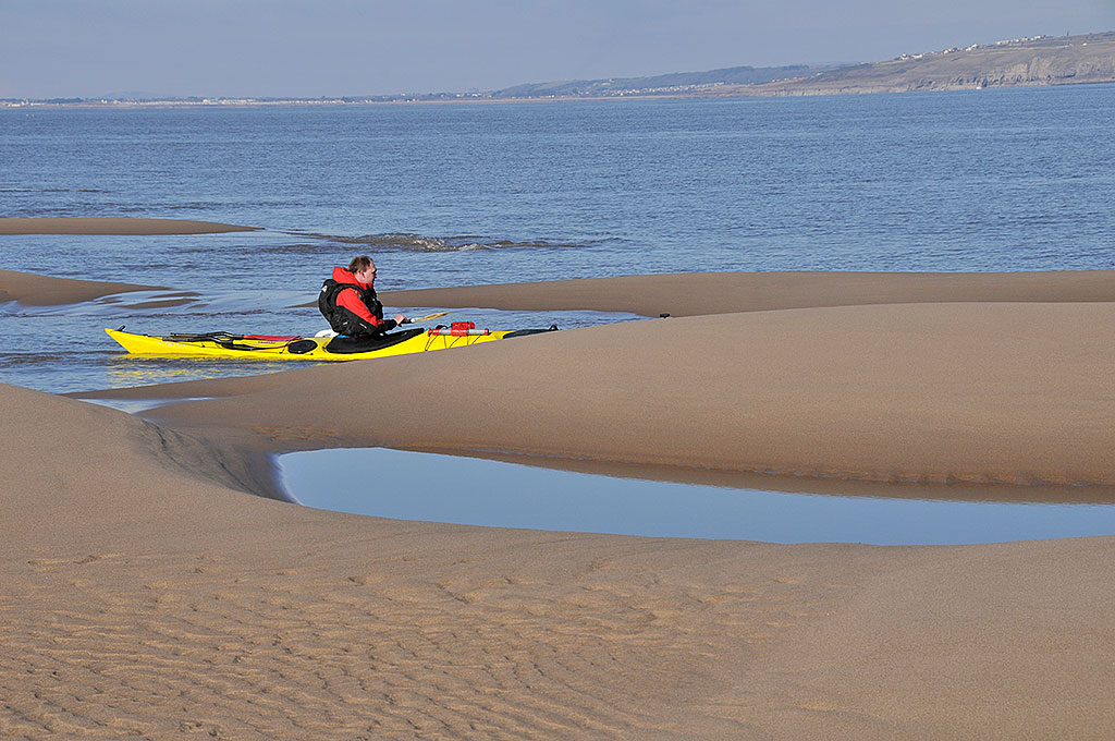 [playing-in-sand.jpg]