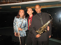 Jason Geh Live Band comprising of the saxophone and er hu player with Jason on the keyboards / piano